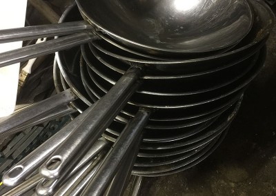 Welding Metal Pans in a Commercial Kitchen